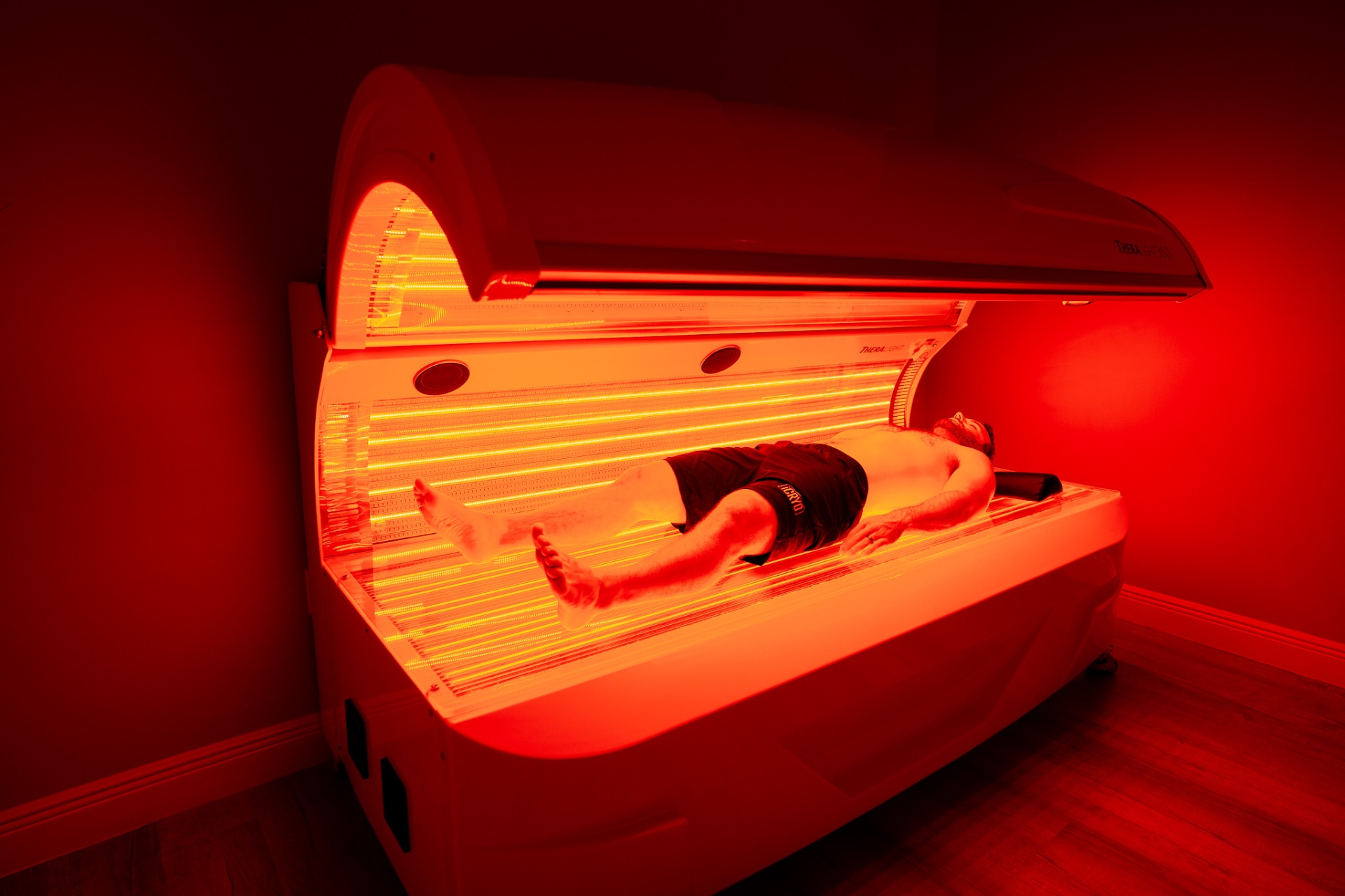 Client receiving red light therapy at iCRYO Branford